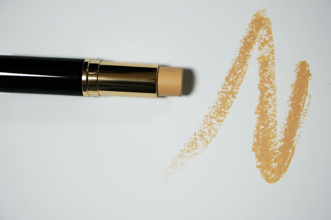 Brown concealer stick